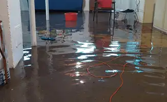 Basement with boiler, cabinets and washing machine completely flooded in Dallas, TX